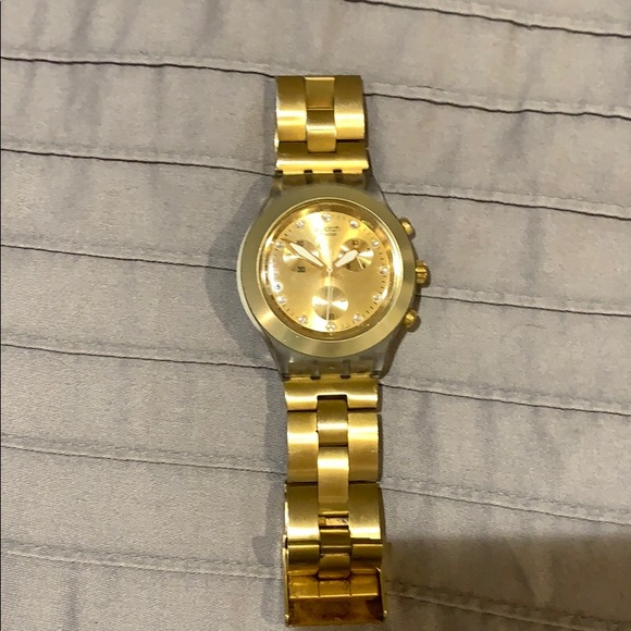 Gold Swatch Watch with stones
